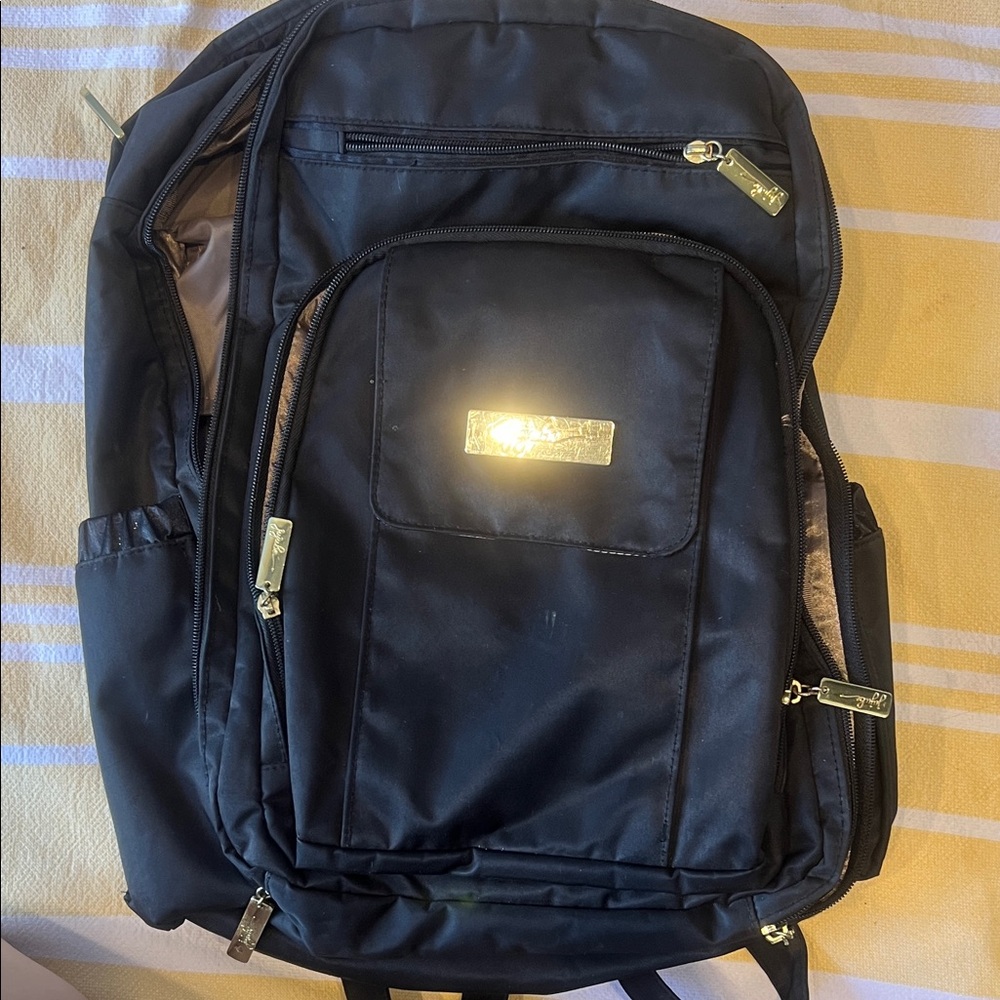 Black Backpack with Gold Accents